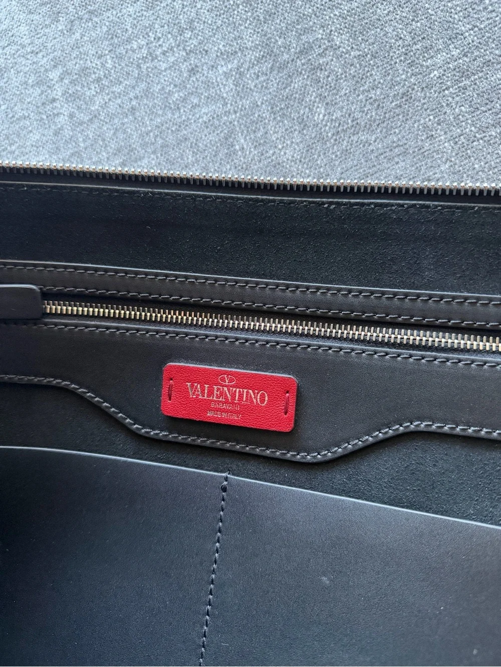 Valentino Garavani VLTN Black Leather Zip Pouch with Stud Accents
